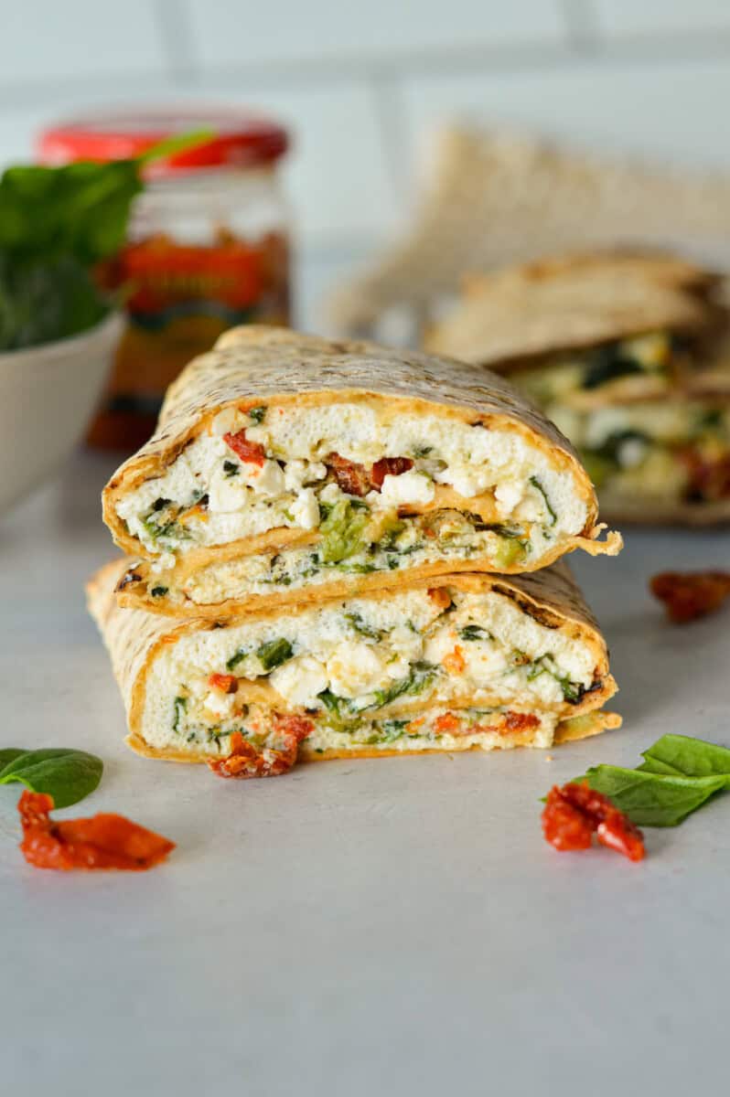 Egg and spinach wrap sliced in half